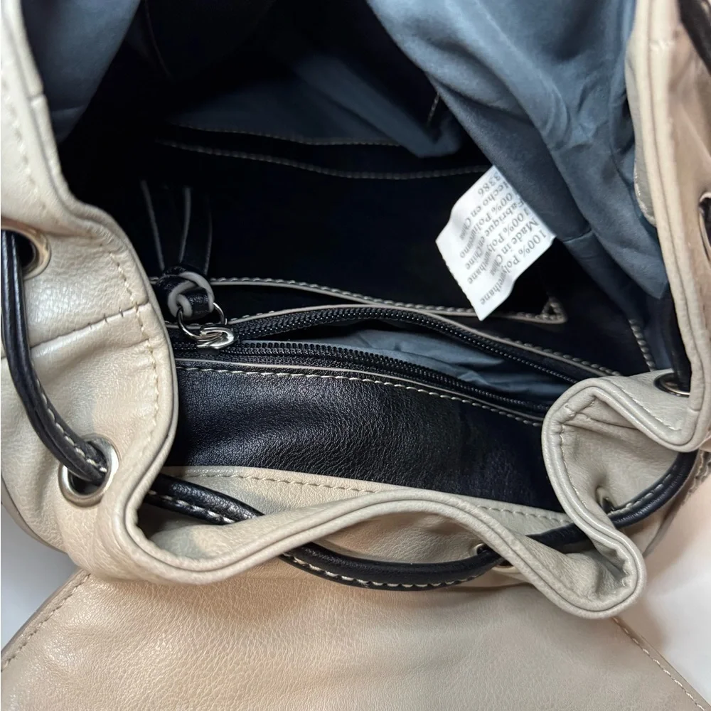 Stylish Tan and Black  Backpack purse in like new condition